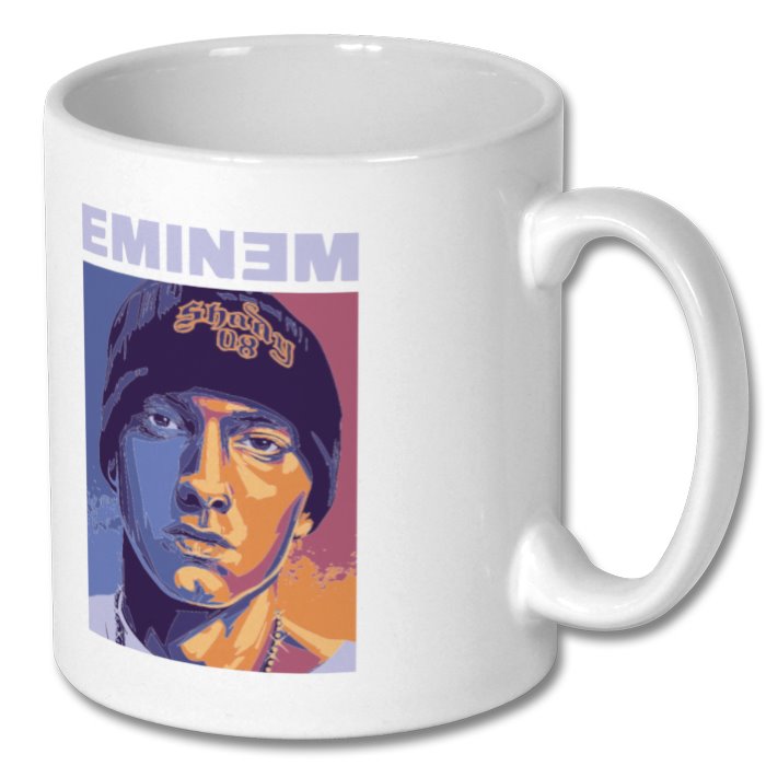 A white ceramic mug with a printed portrait of Eminem, featuring his name and the text 'EMINEM' prominently on the side.